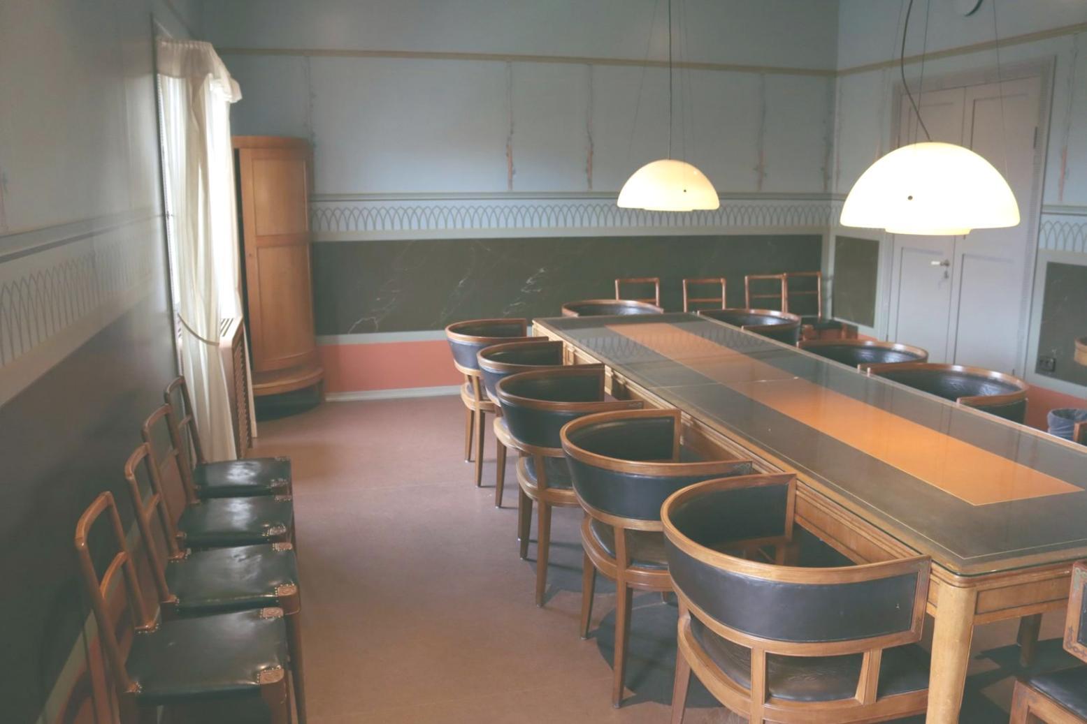 Budget planning workshop materials with categorized expense sheets